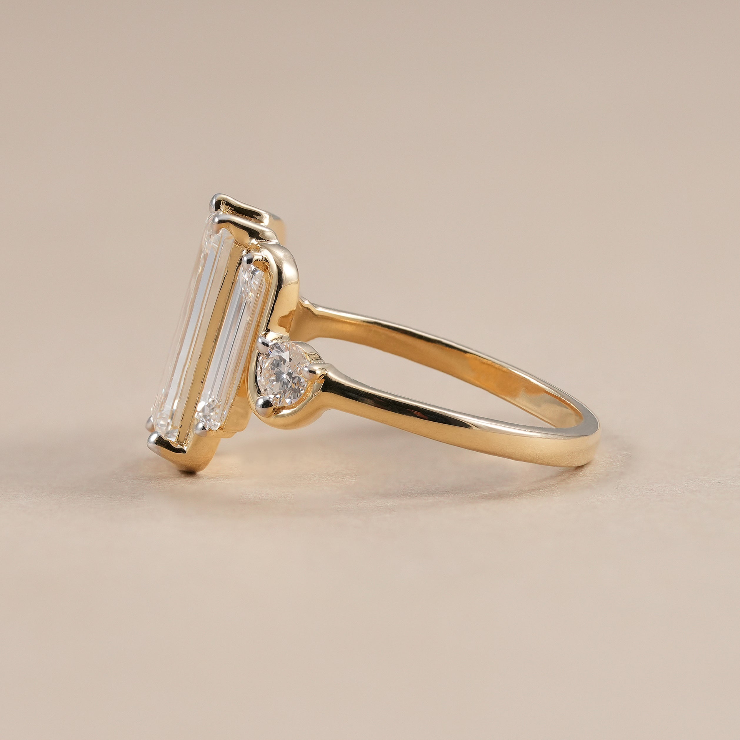 Emerald Cut Lab Grown Diamond Ring with Round Side Stones