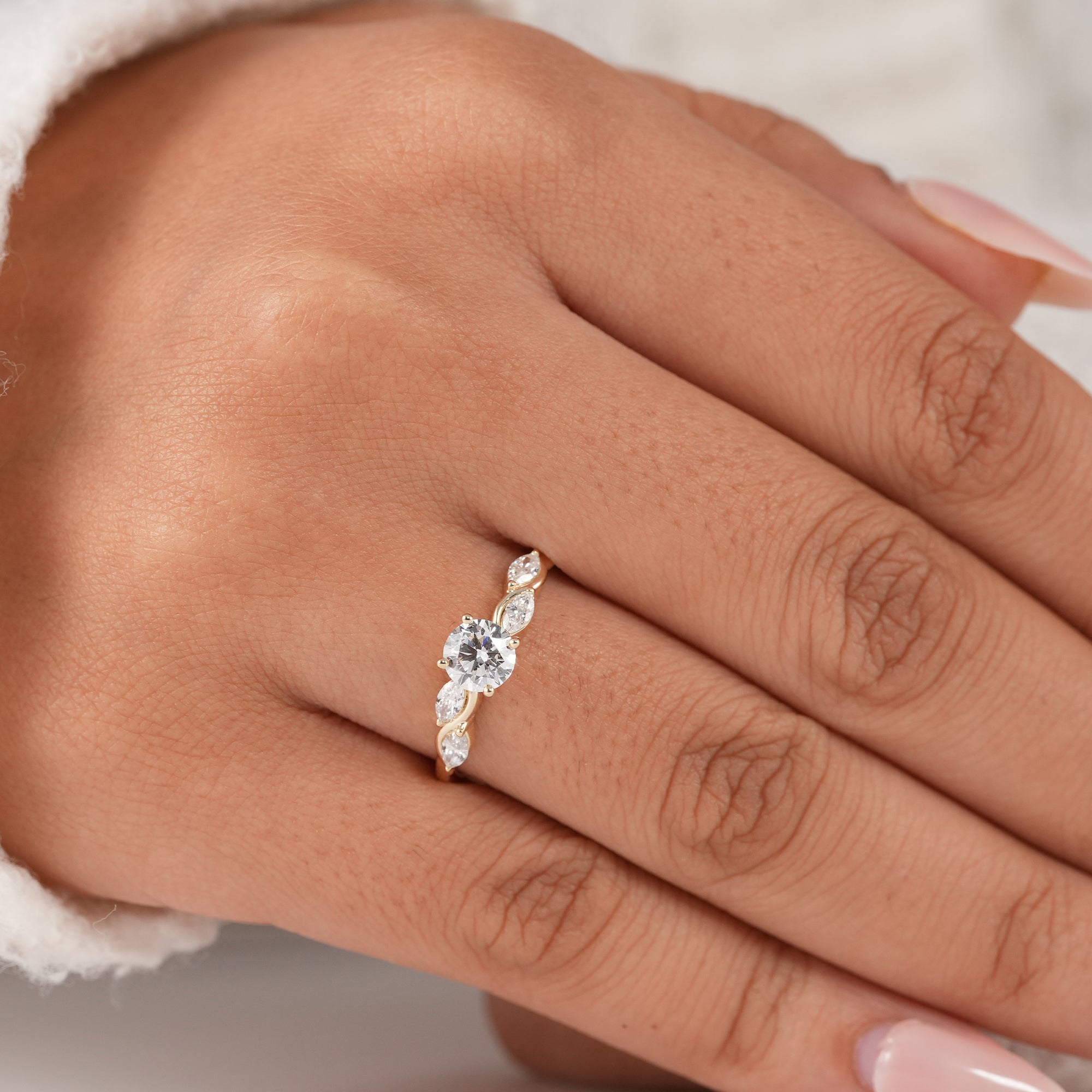 Modern lab grown diamond engagement ring with elegant curved band.
