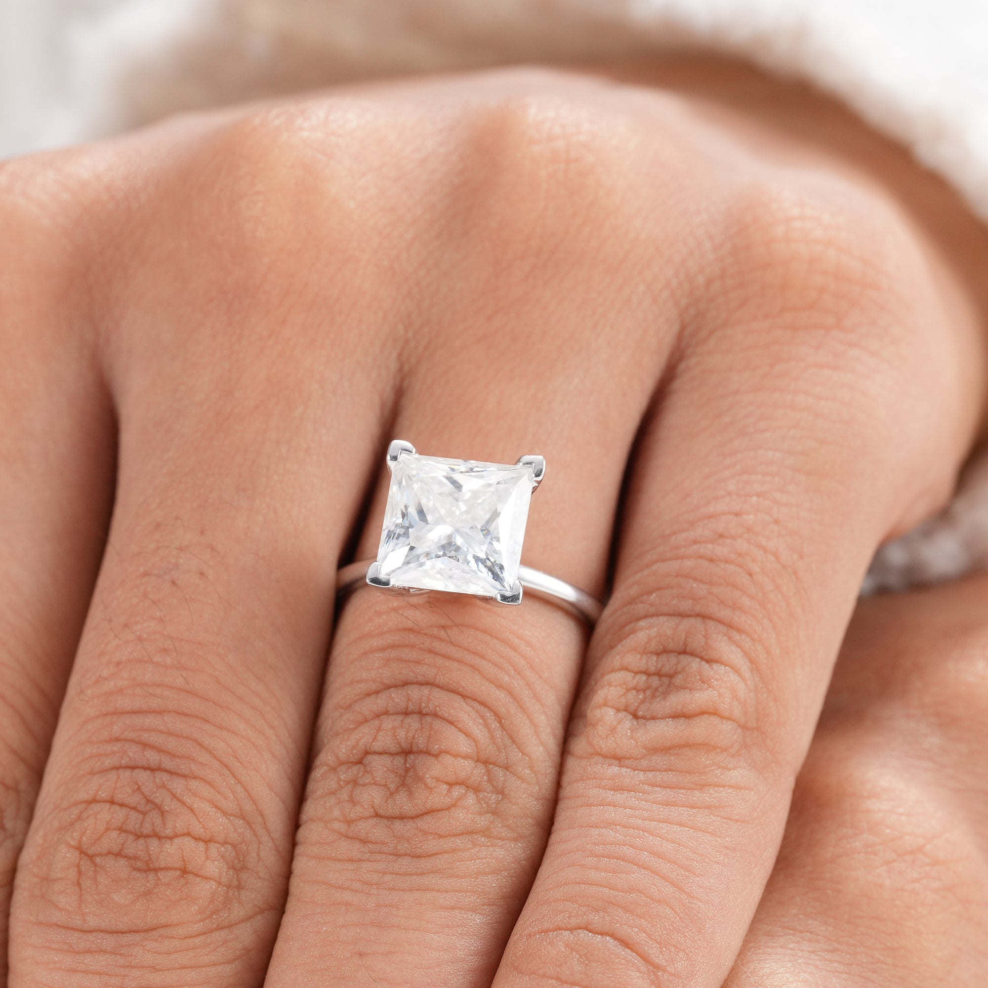 High brilliance princess cut diamond ring for engagement.