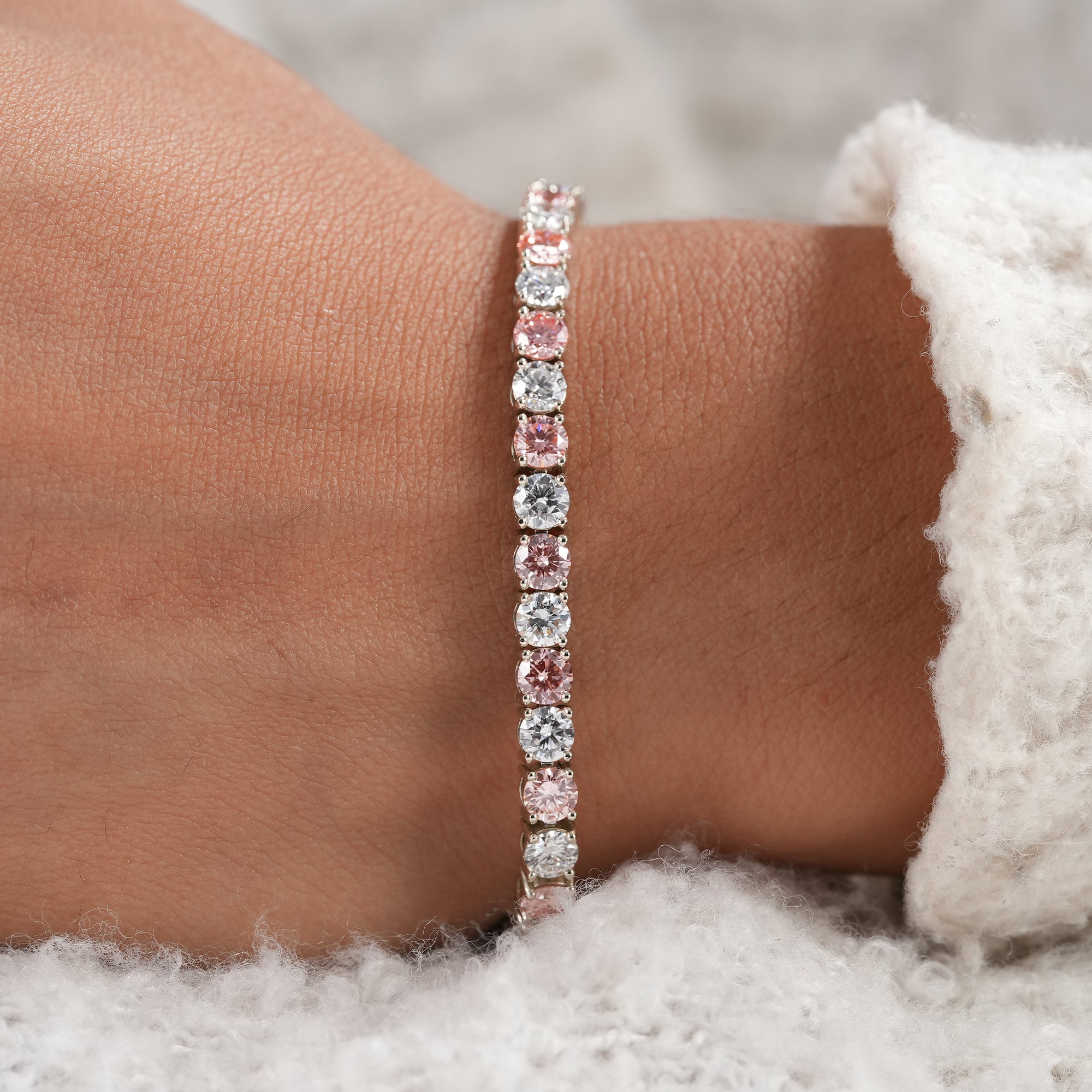 Elegant 4.20MM white and pink lab diamond tennis bracelet in white gold.