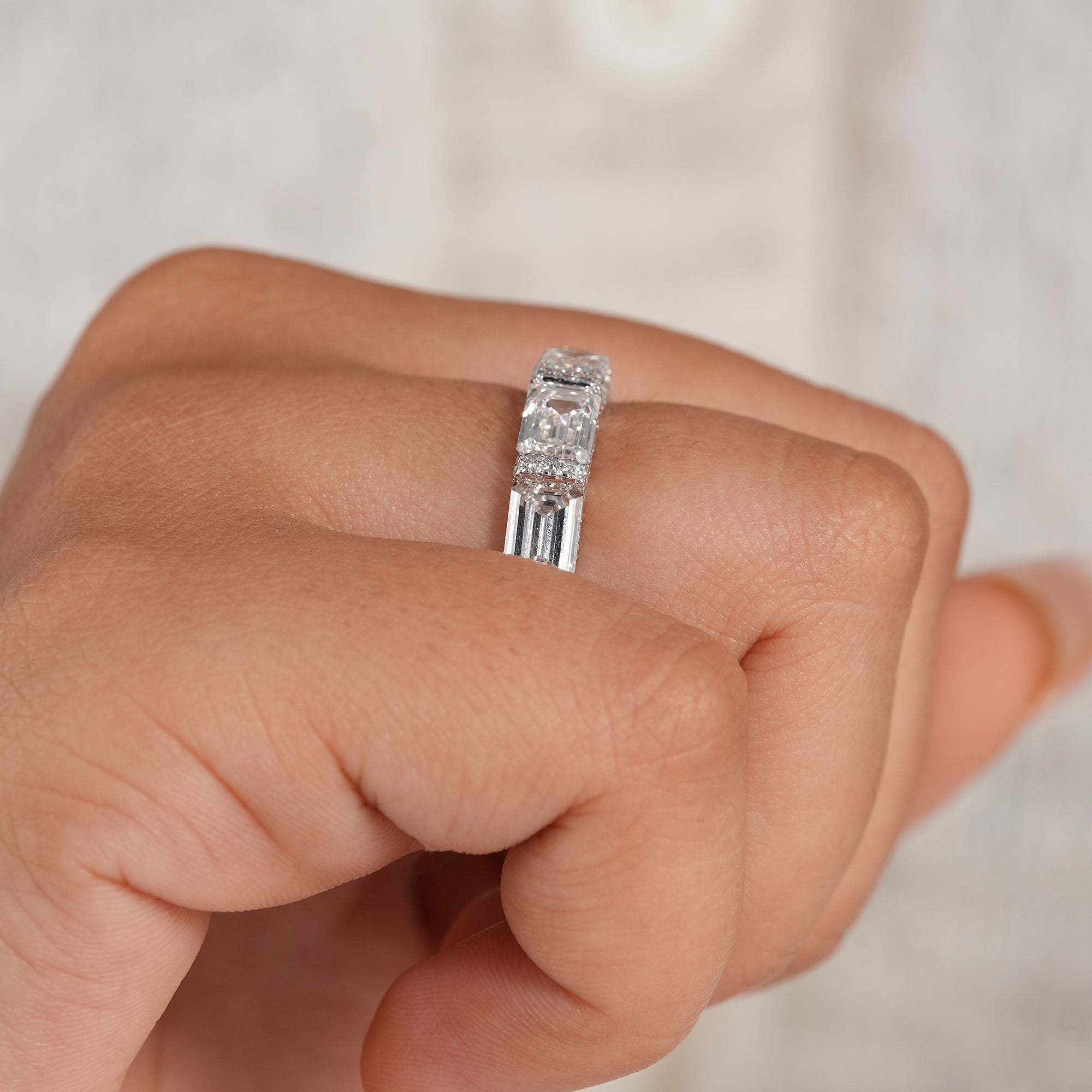 Emerald cut full eternity ring for bridal jewelry.