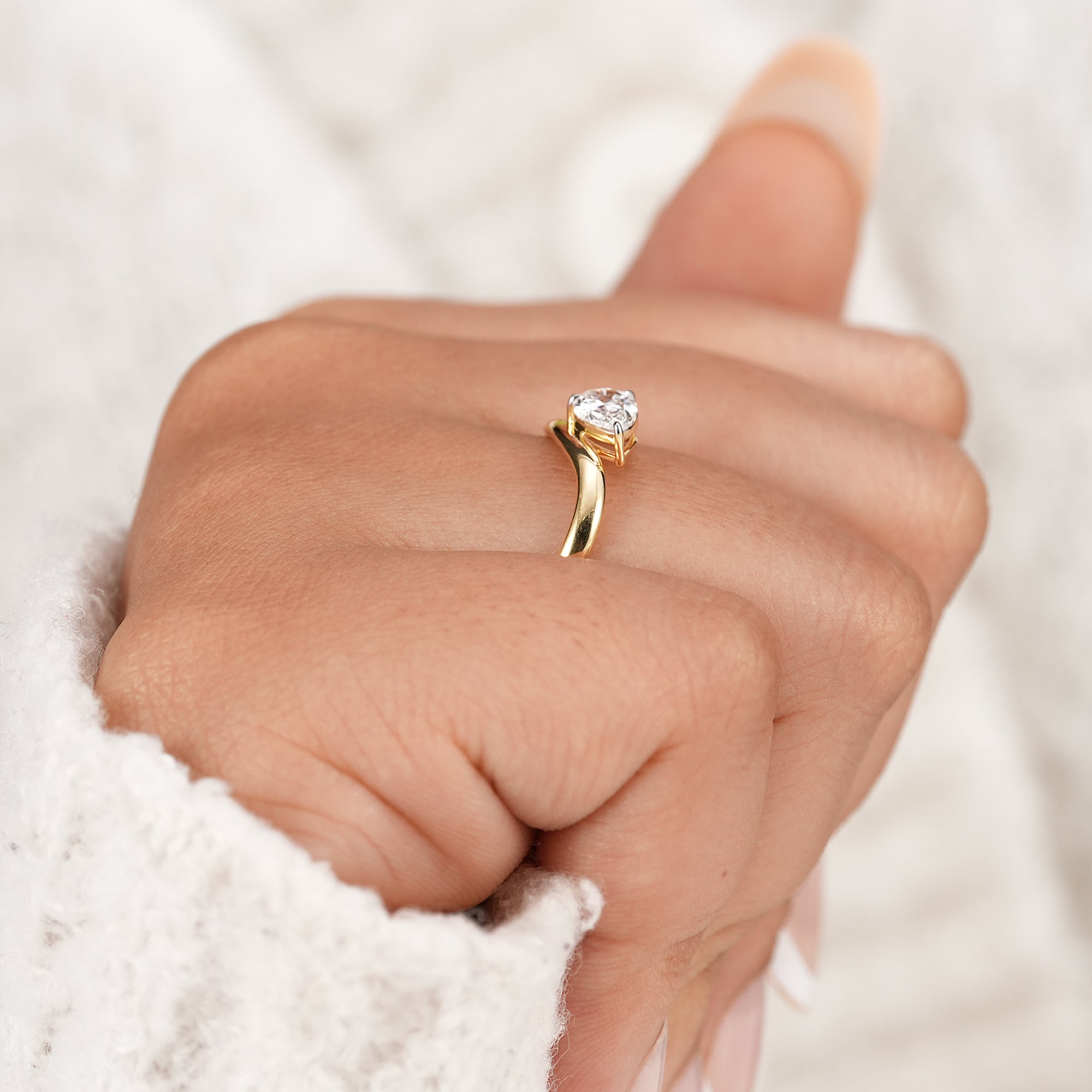 Pear cut lab diamond pinky ring with curved band