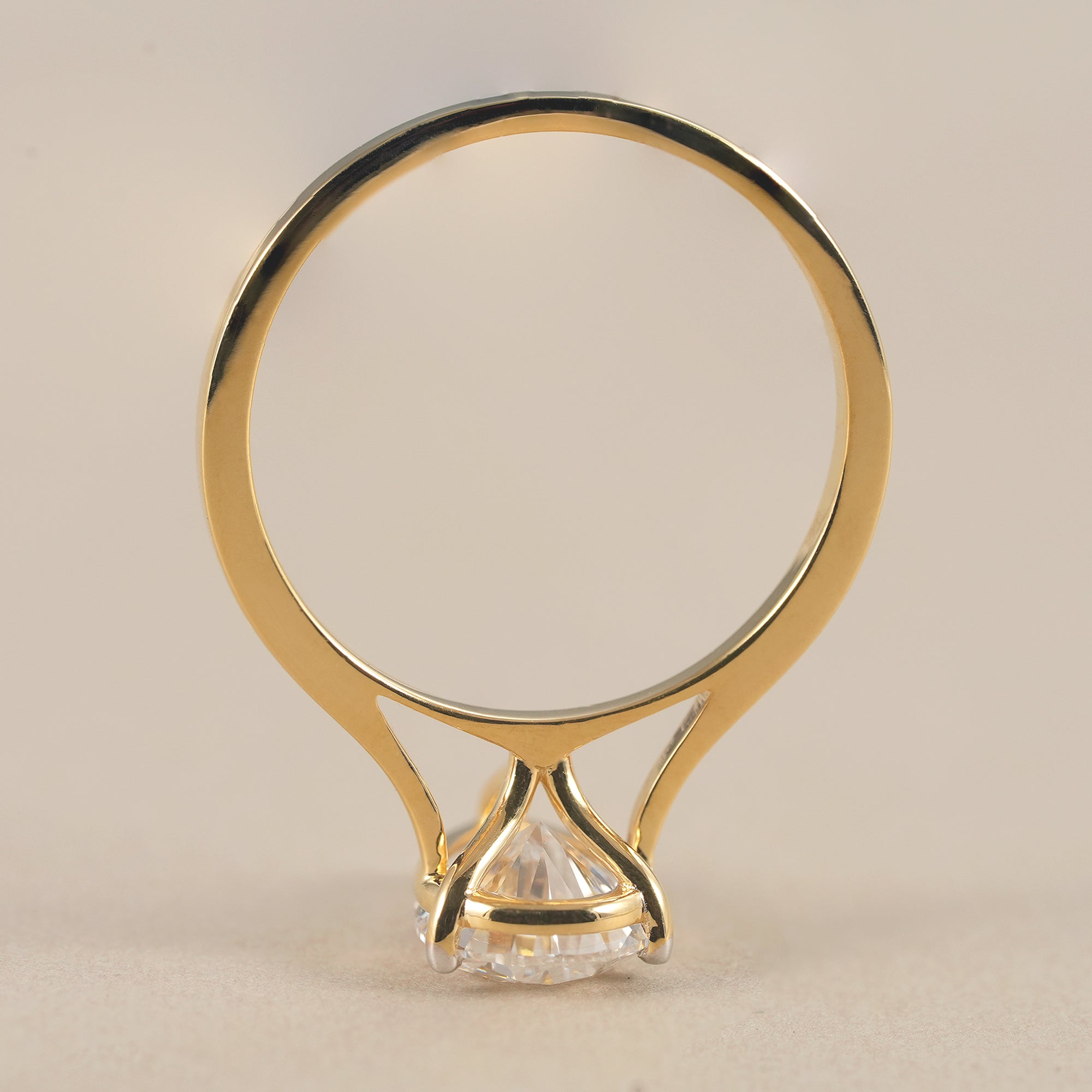 Women's pear engagement ring in 14K yellow gold