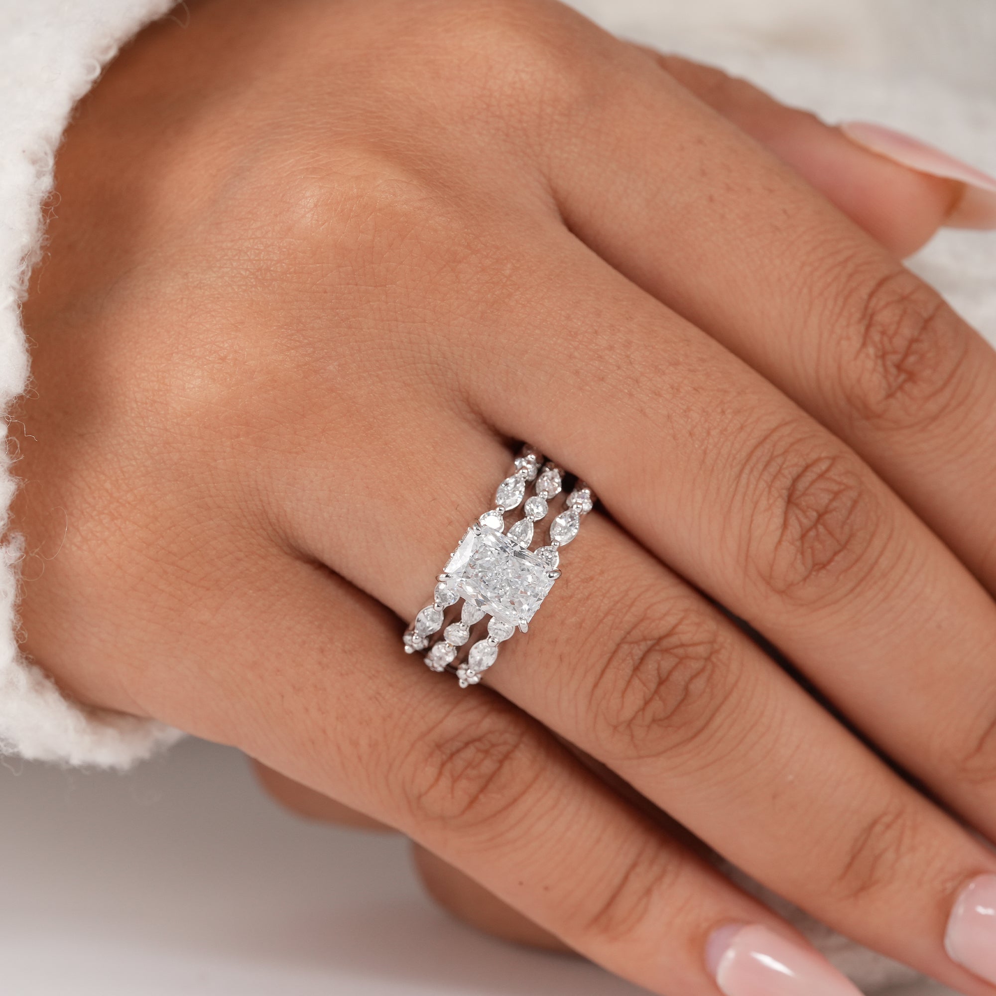 Handcrafted radiant diamond wedding ring set.