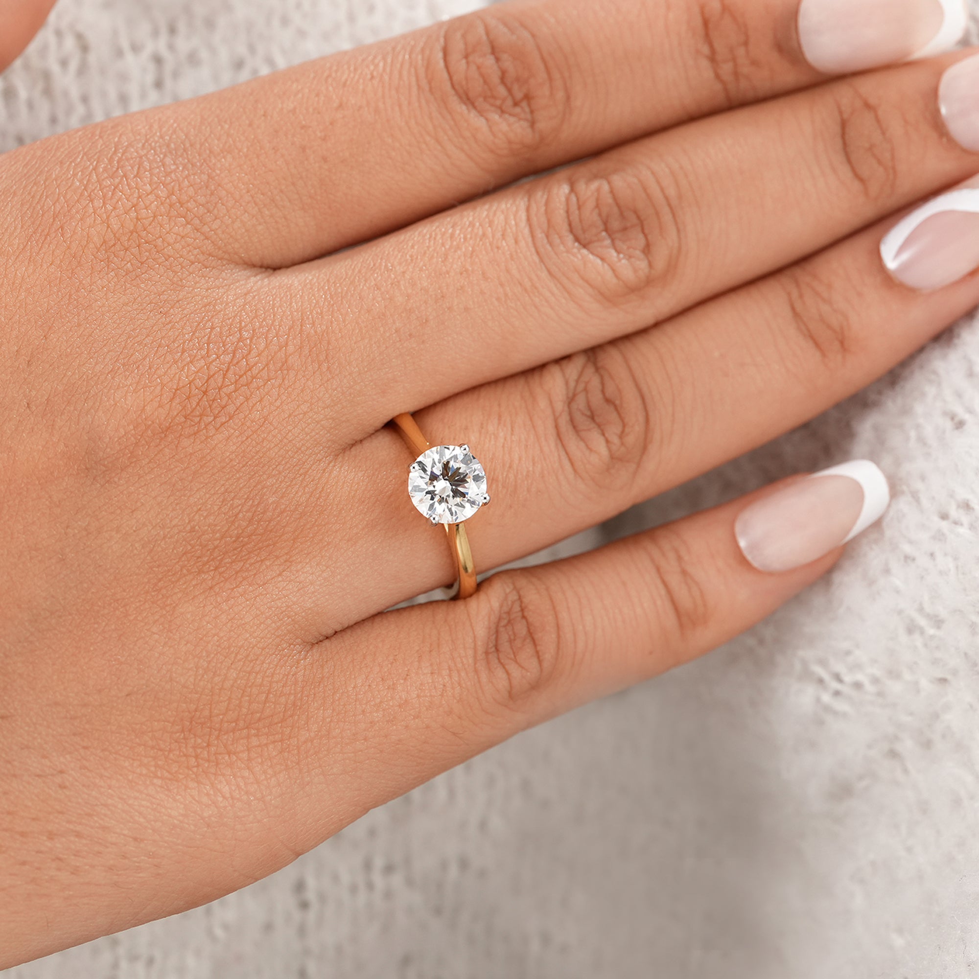 Elegant round lab diamond wedding ring with cathedral setting