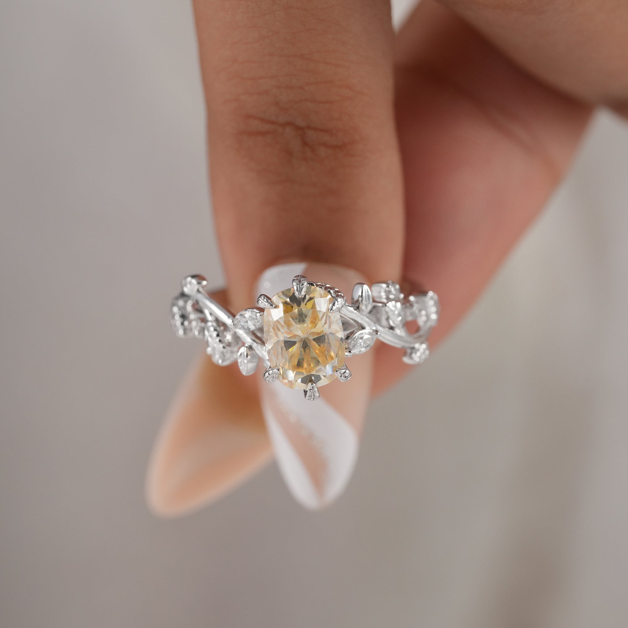 Elegant yellow lab diamond ring with floral detailing.