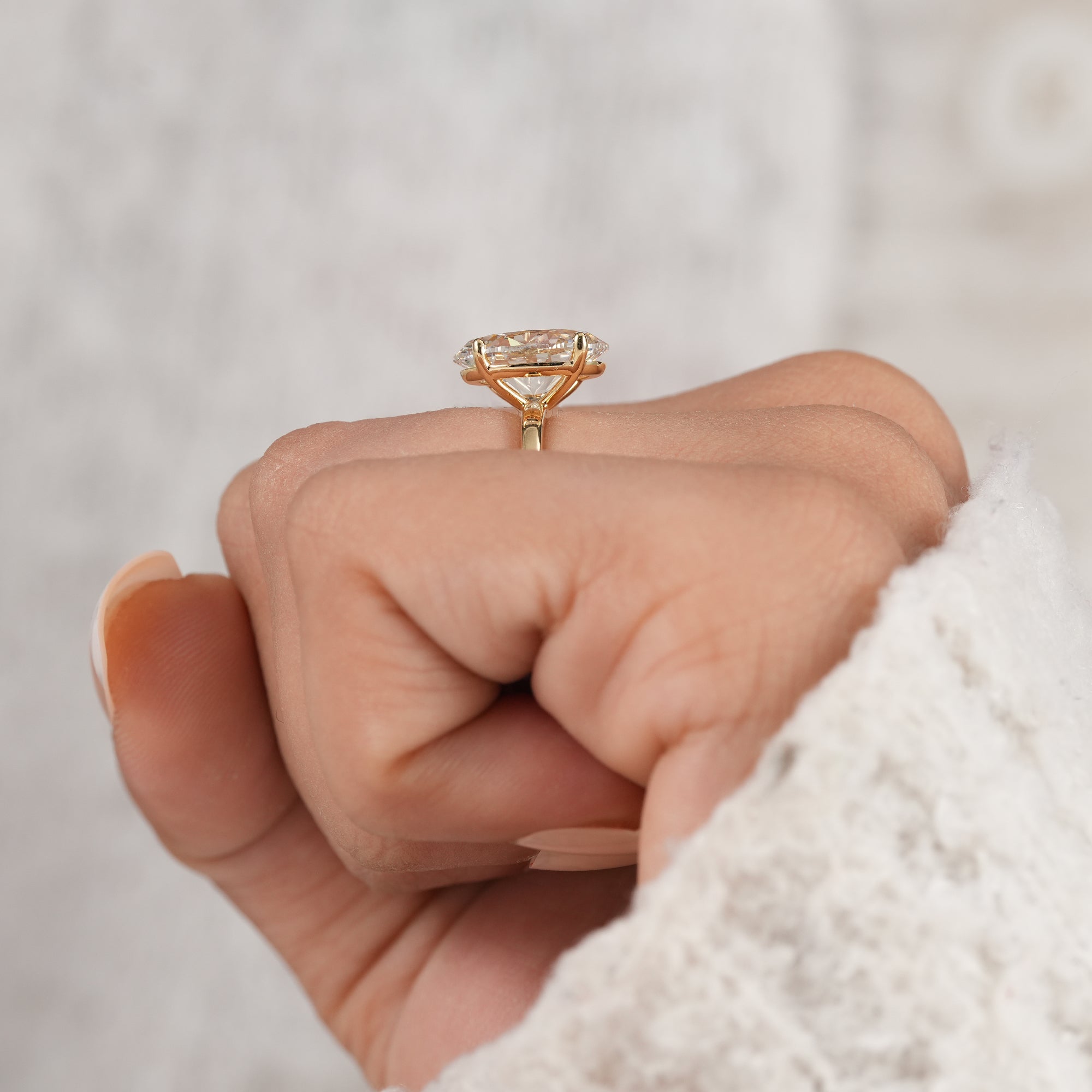 Close-up of 3.5 CT oval lab diamond solitaire ring.