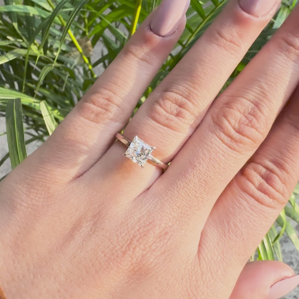 Minimalist solitaire ring with a brilliant princess cut lab grown diamond