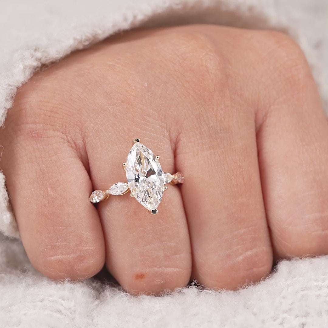 Elegant marquise lab grown diamond ring with nature inspired accent band