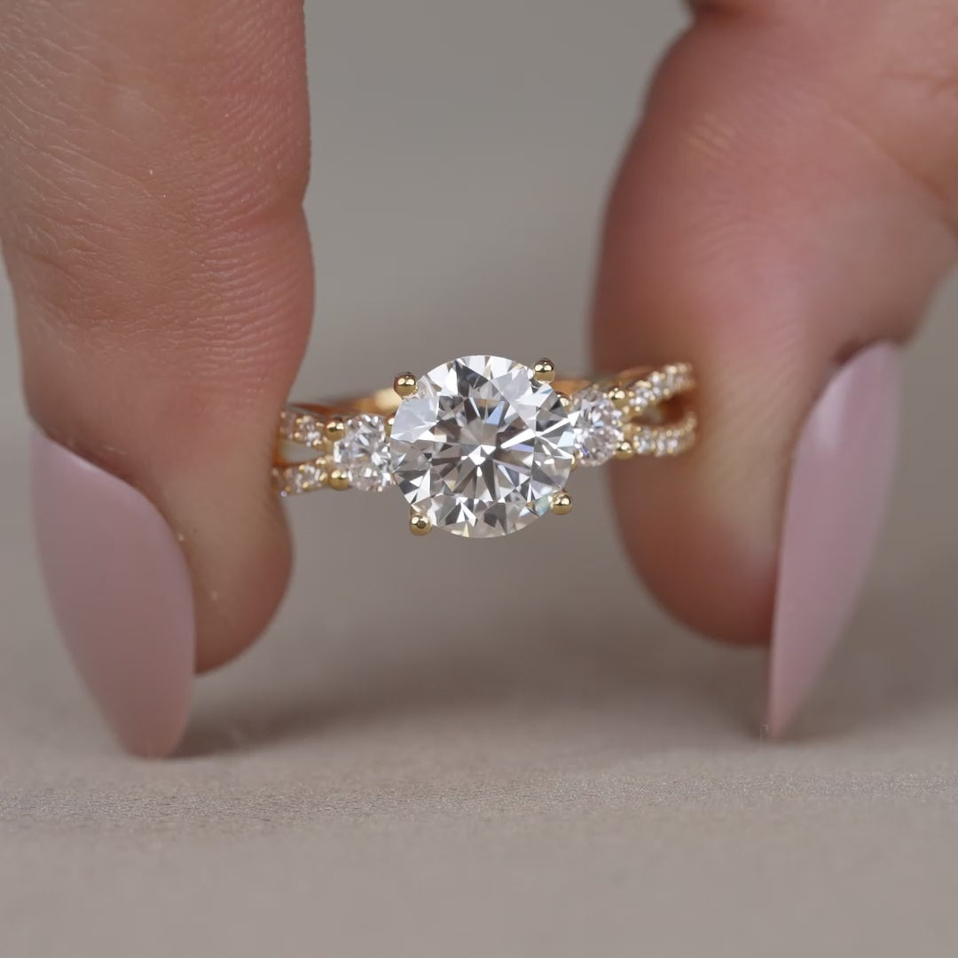 Yellow gold round lab grown diamond ring with side stones