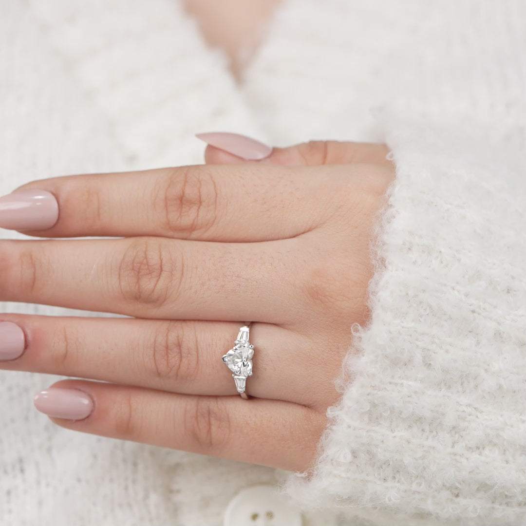 Romantic heart shaped ring showcasing lab grown diamond and tapered baguettes
