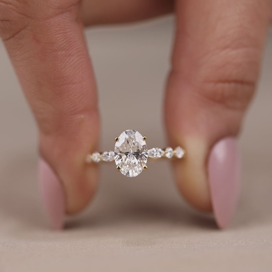 Lab grown oval diamond ring featuring vintage inspired side detailing