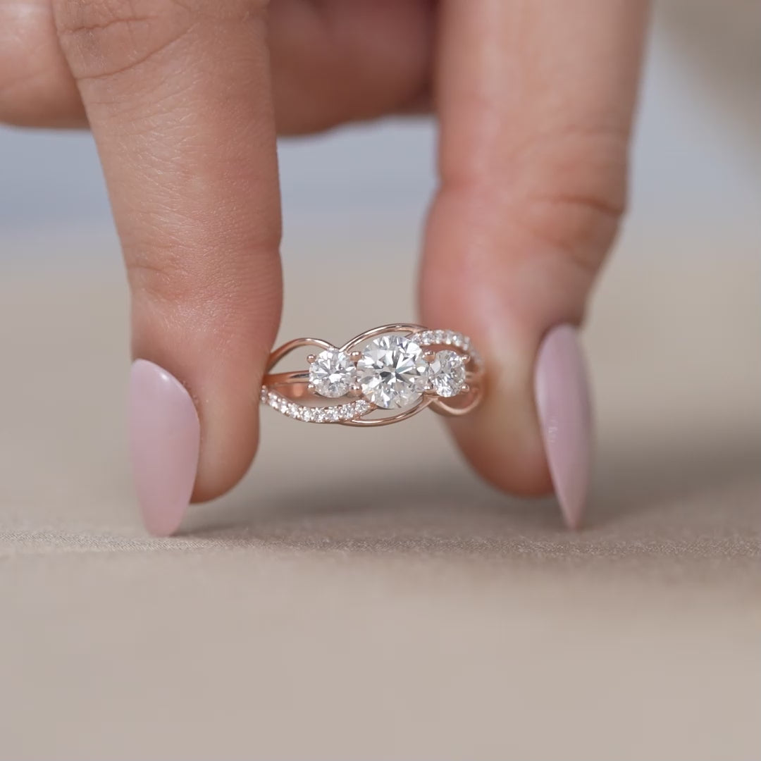 Rose gold engagement ring with round lab grown diamond trilogy design
