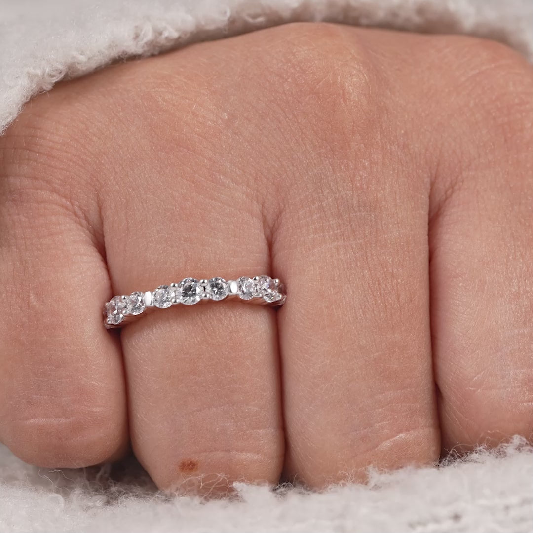 Round cut lab diamond eternity ring in elegant rose gold design