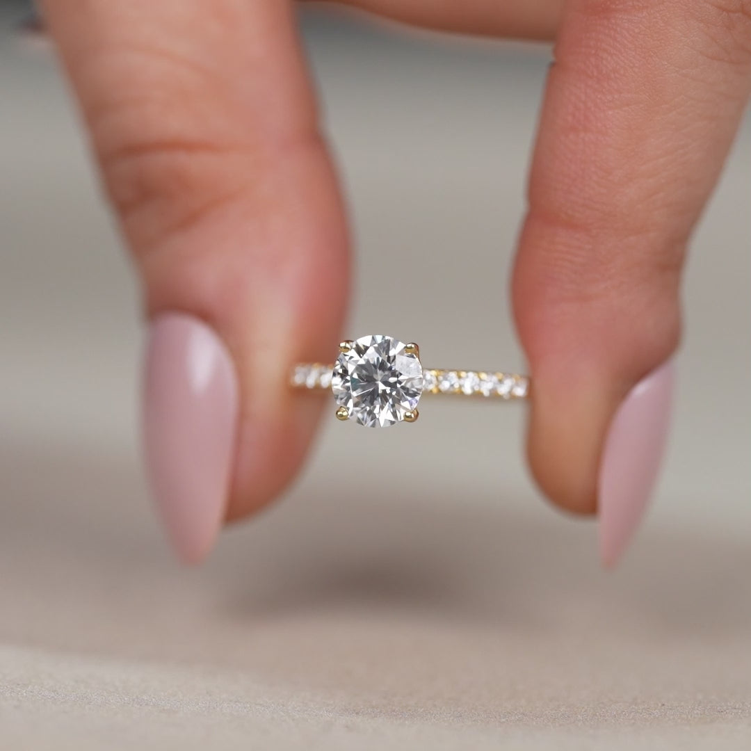 Classic round cut lab grown diamond engagement ring with pavé details