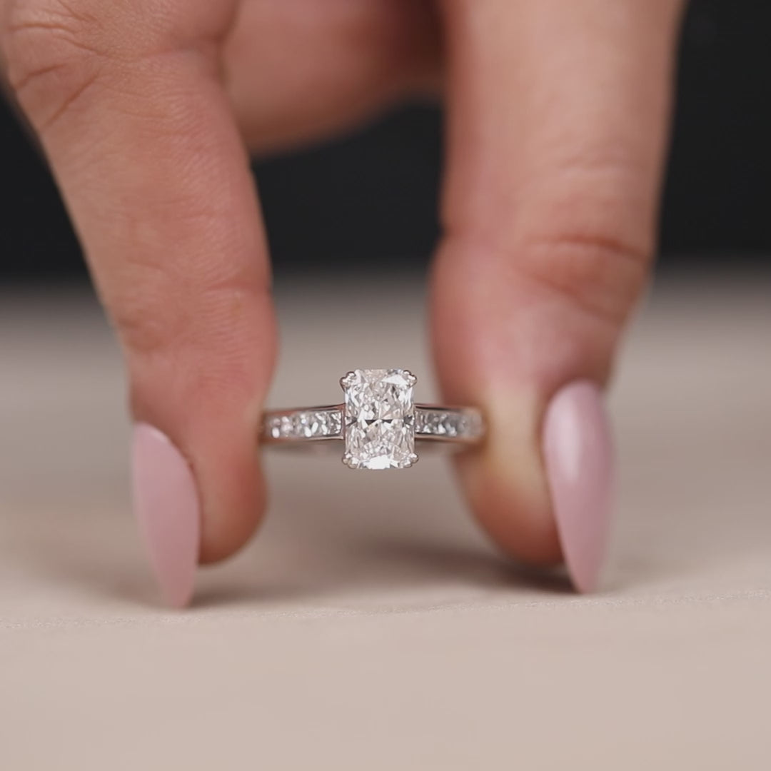 Vintage style engagement ring featuring a radiant cut lab diamond.
