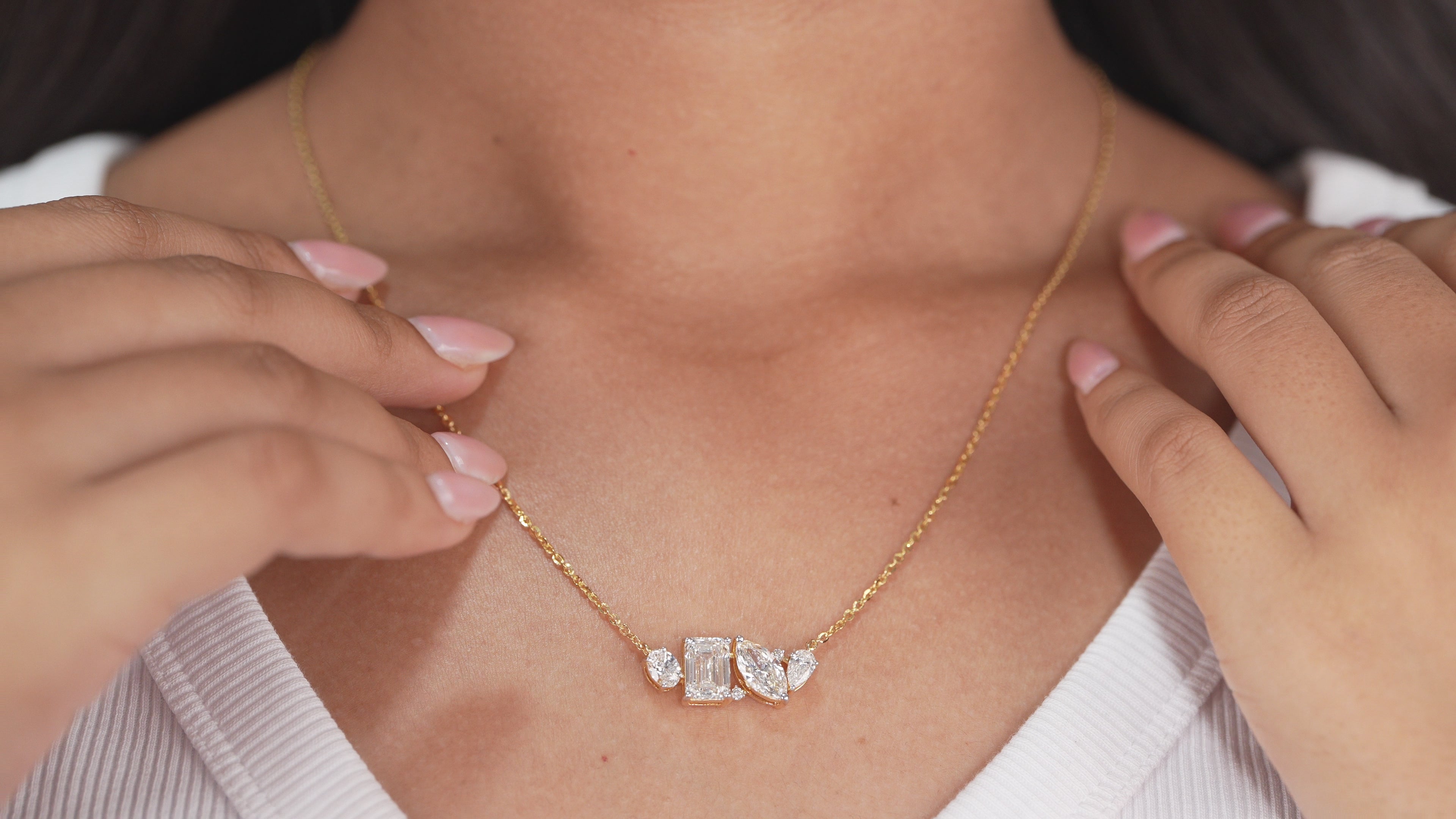 Women's multi stone diamond pendant necklace with emerald and marquise diamonds
