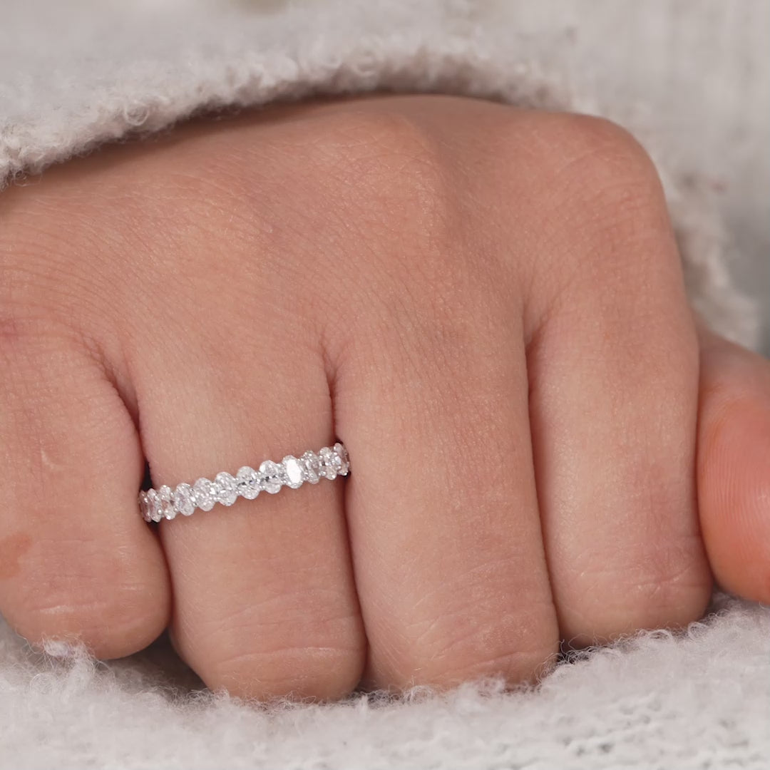 Oval diamond full eternity band with shared prong white gold setting