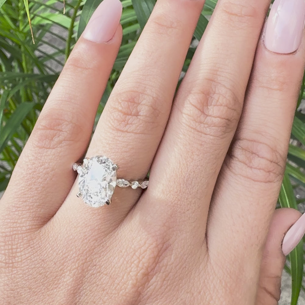 Fine jewelry oval lab grown diamond engagement ring with marquise side accents