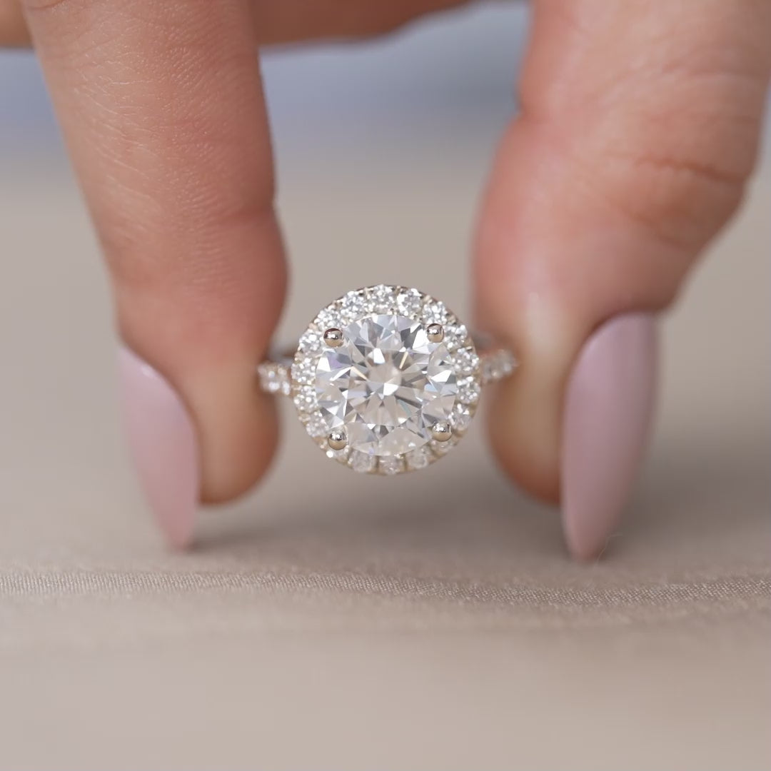 Yellow gold engagement ring featuring round lab grown diamond halo