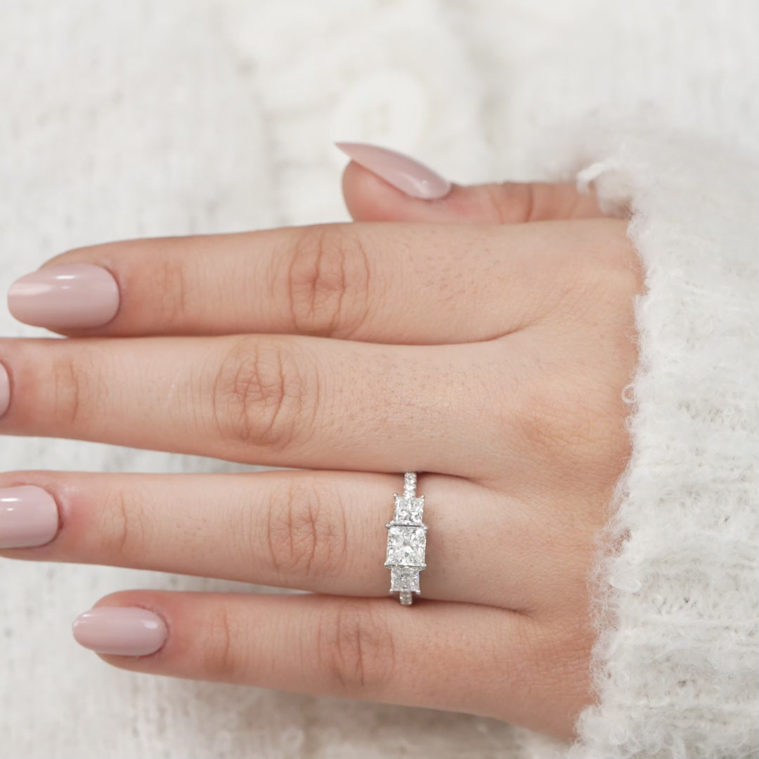 Elegant three stone ring with princess cut lab grown diamonds