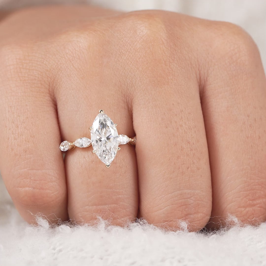 Marquise Cut Diamond Engagement Ring With Marquise Accents Band