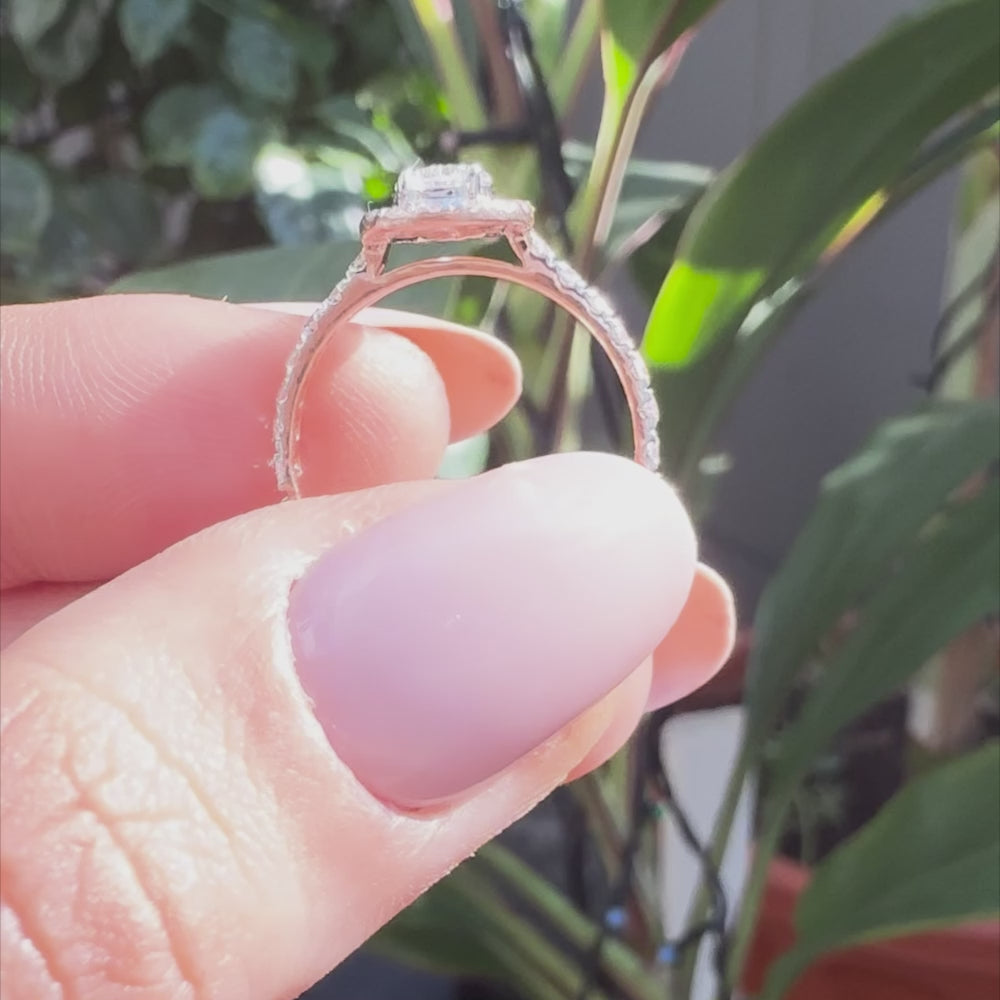 Elegant pear lab grown diamond halo ring with pavé set side stones