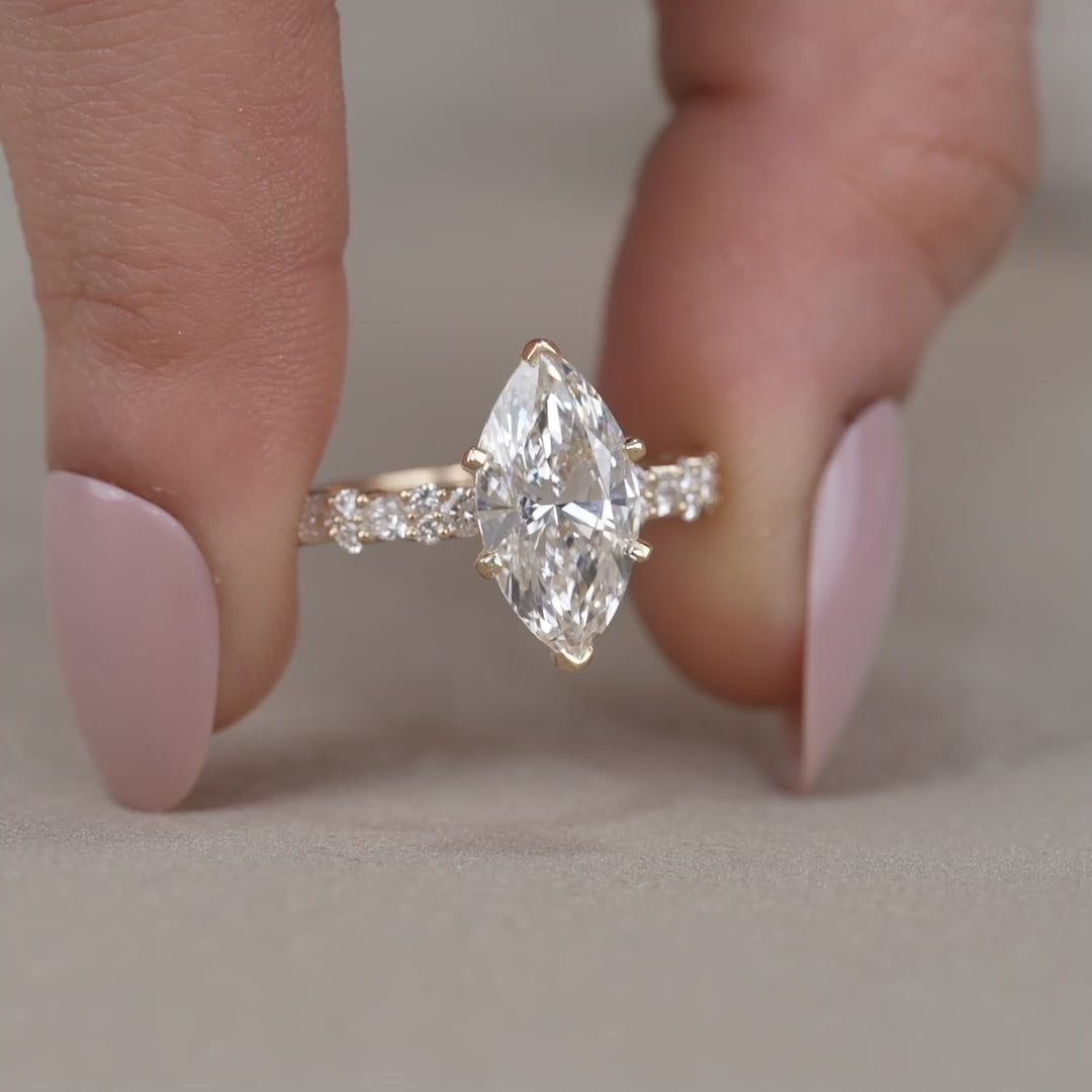 Elegant marquise lab grown diamond ring with pavé accents
