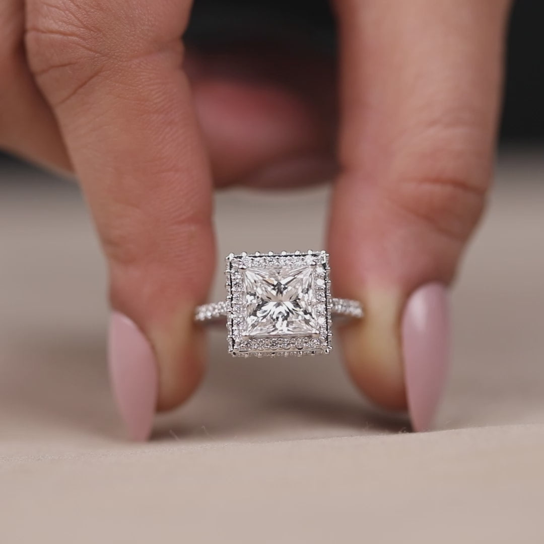 Square halo engagement ring featuring a princess cut lab grown diamond