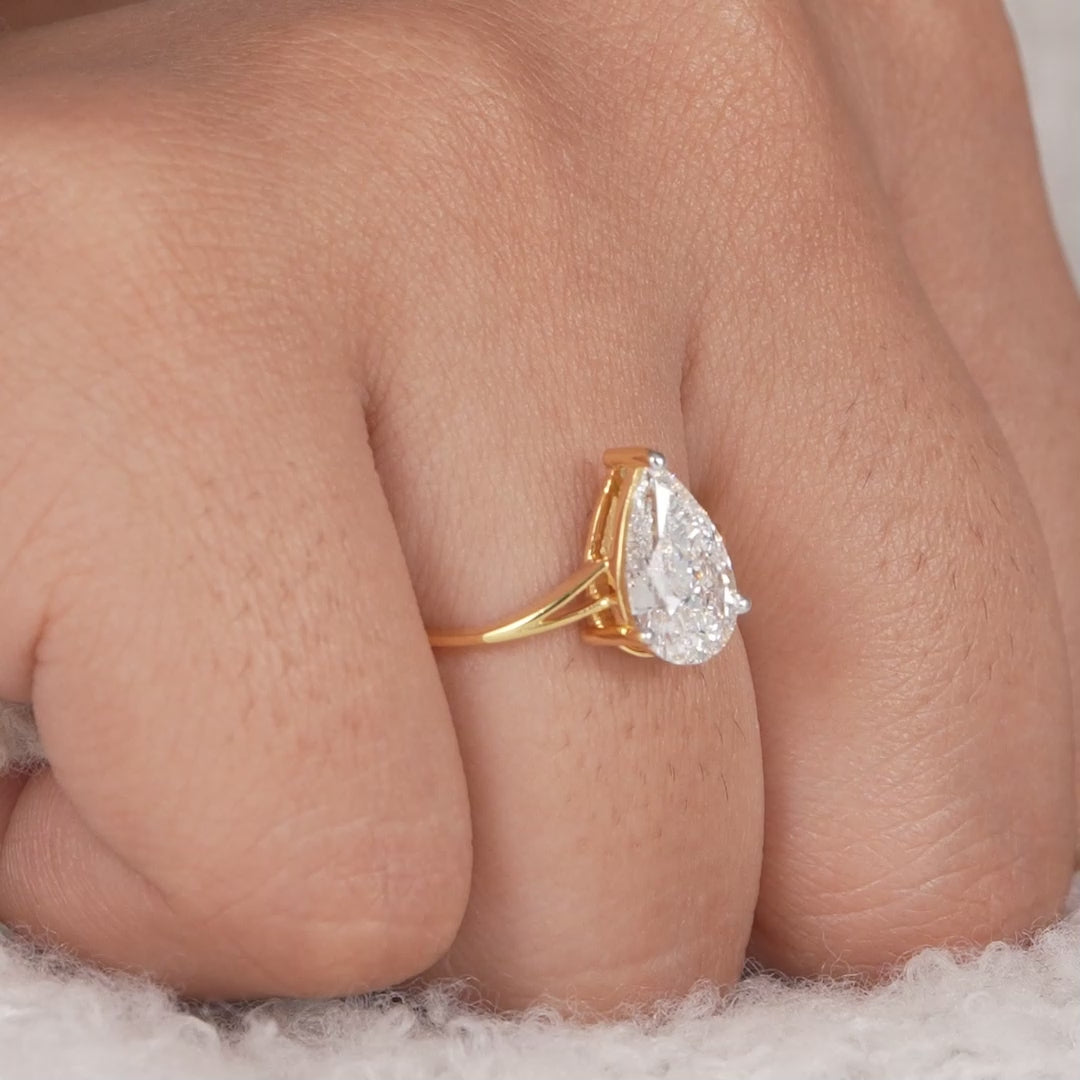 Pear lab grown diamond split shank engagement ring in yellow gold