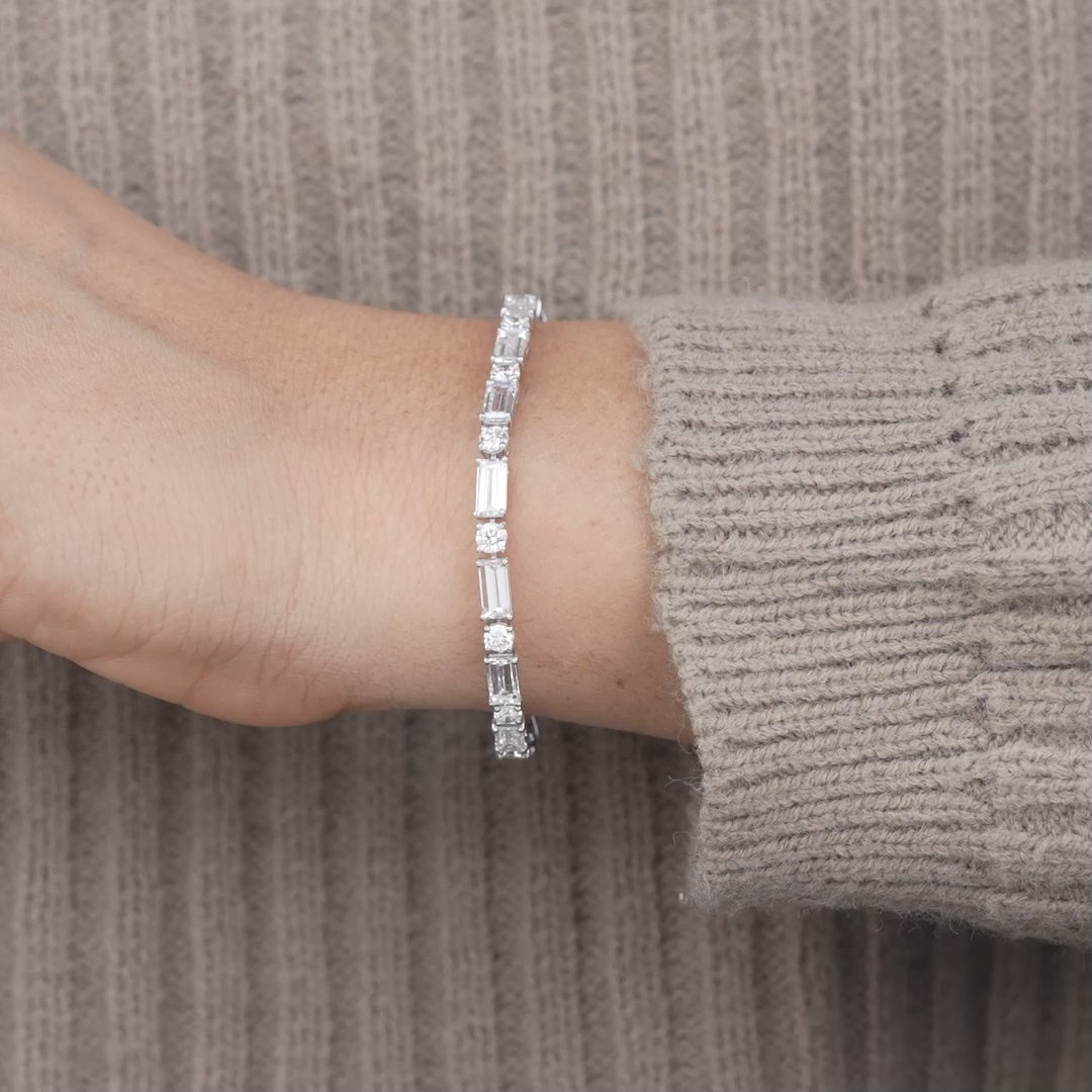 White gold tennis bracelet featuring baguette and round lab grown diamonds