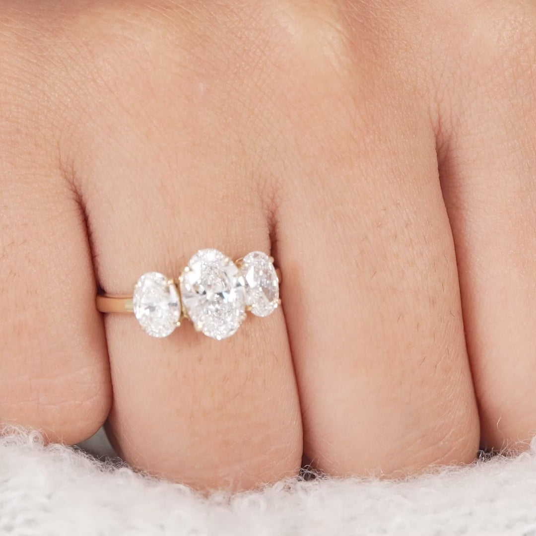 Sustainable oval three stone diamond ring with lab grown diamonds