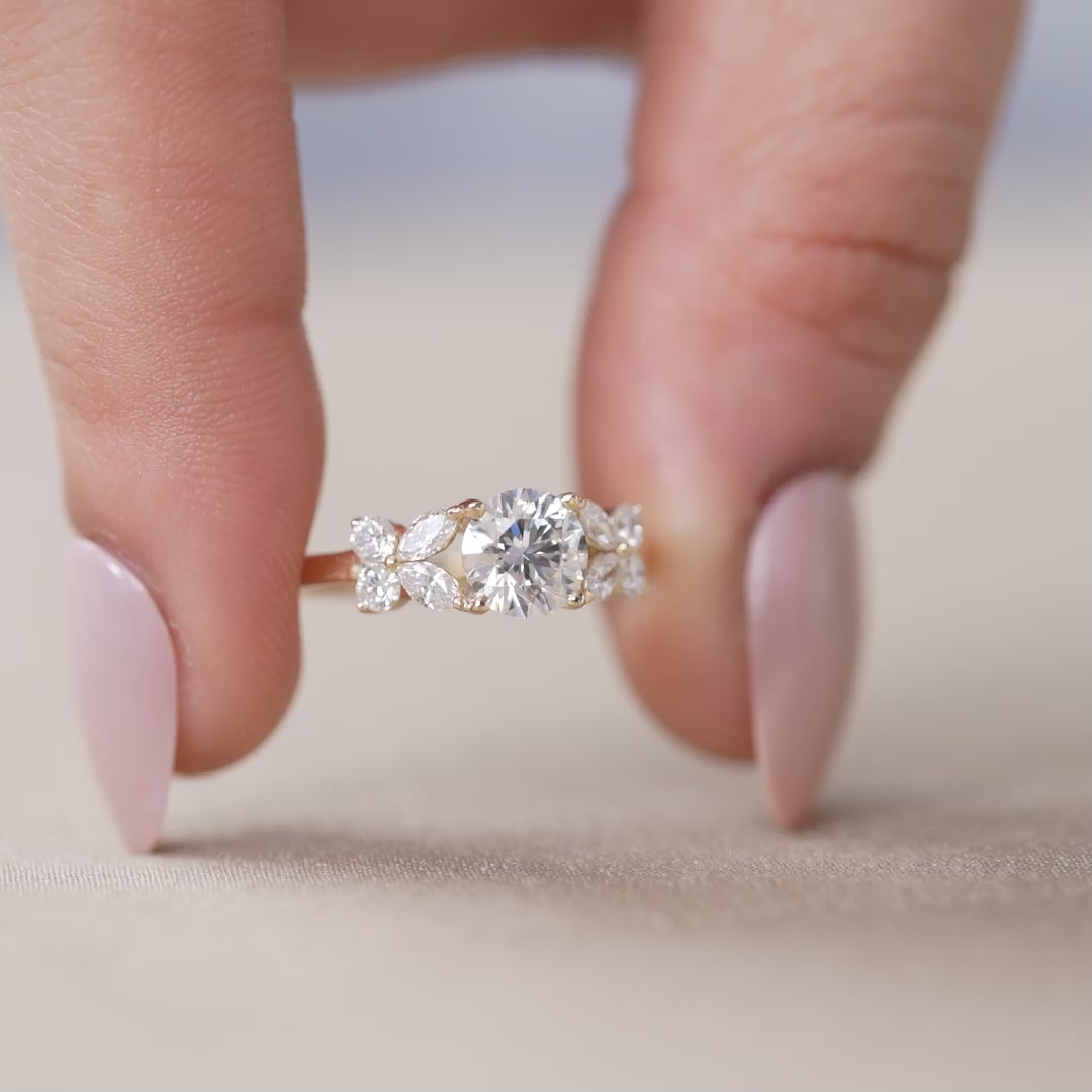 Elegant round lab grown diamond ring with petal side stones