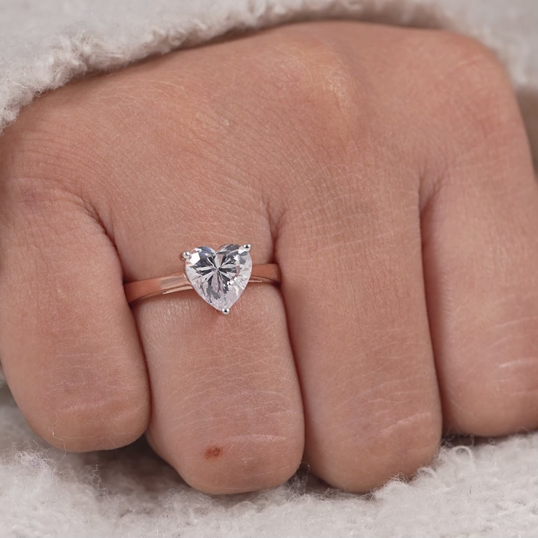 Heart shaped lab grown diamond engagement ring with elegant solitaire setting