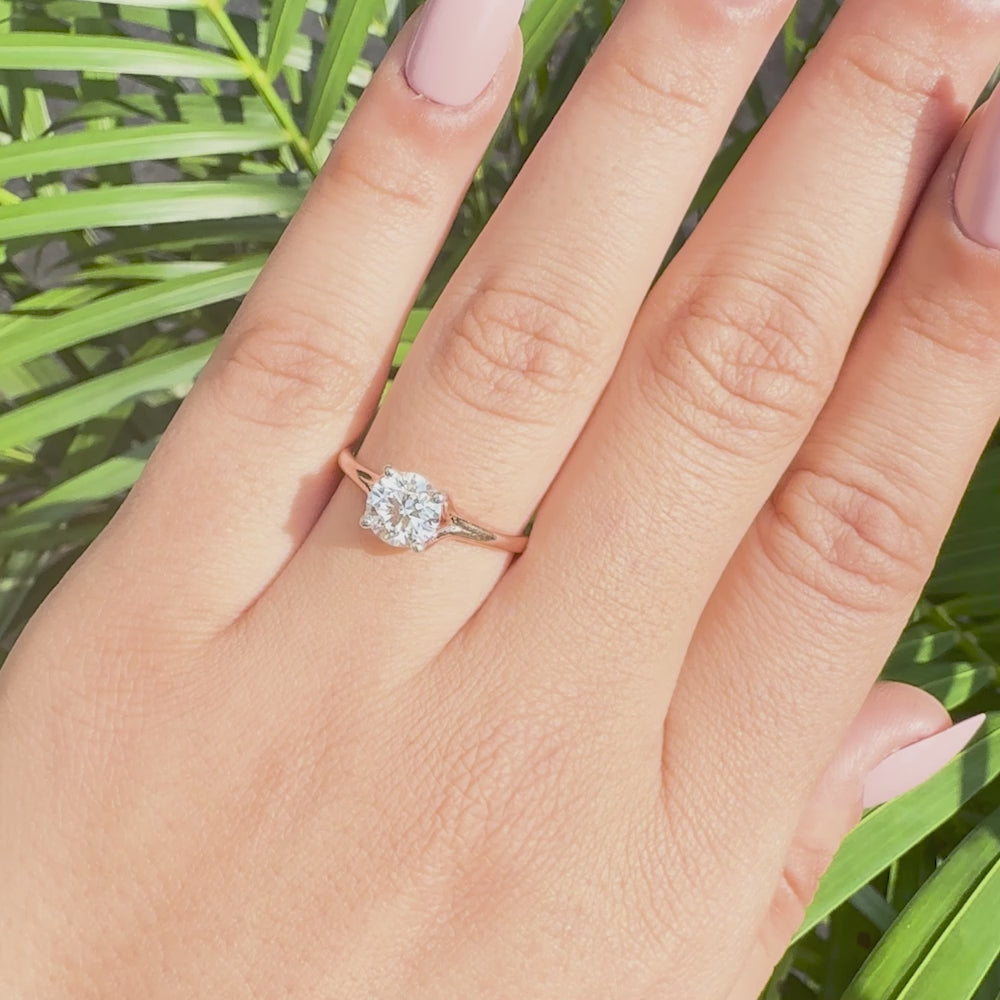 Round lab grown diamond engagement ring with soft tapered shoulders