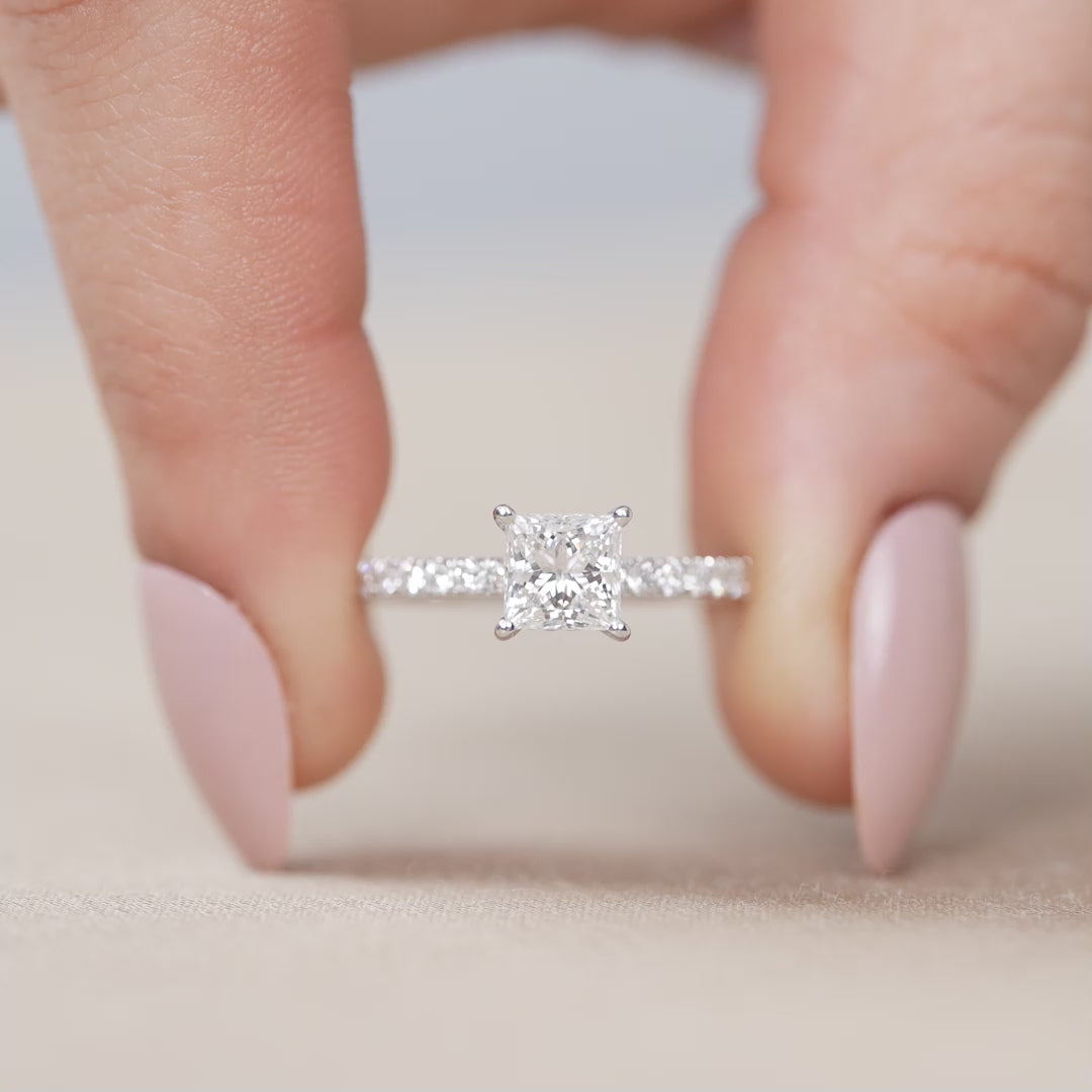 Square lab grown diamond solitaire ring with delicate pavé shoulders