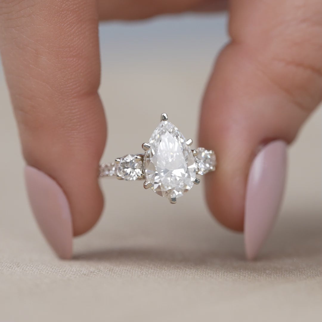 Lab grown diamond pear three stone ring for wedding anniversary