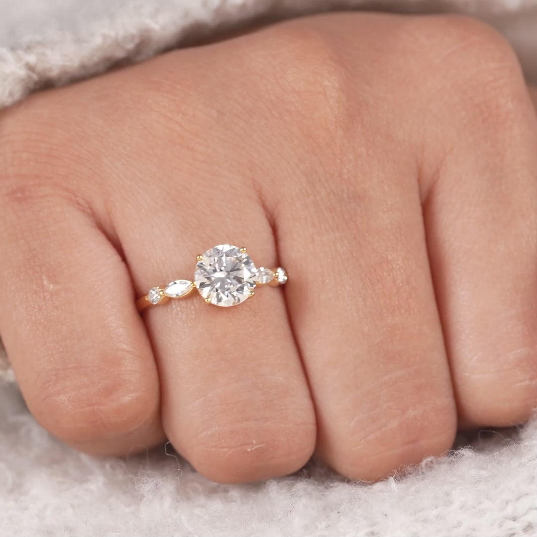 Round cut lab diamond engagement ring in yellow gold with accent stones