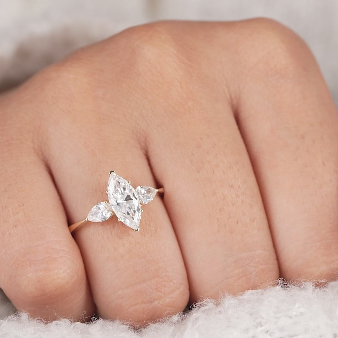 Three Stone Marquise Cut Lab Diamond Engagement Ring With Pear Side Stones