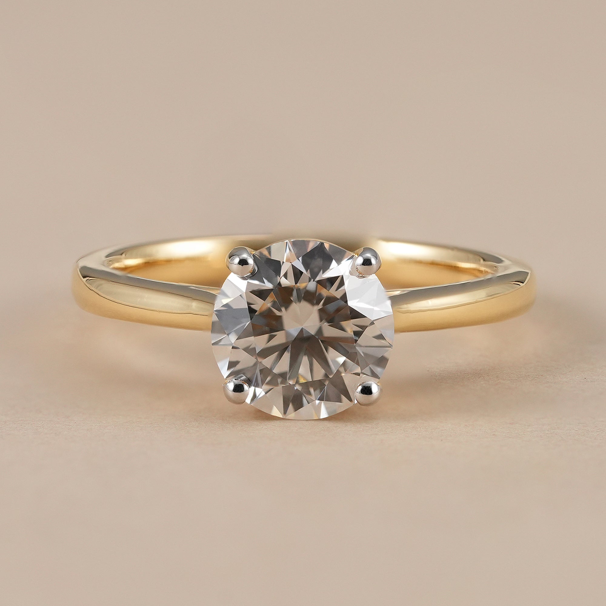 Round lab grown diamond solitaire engagement ring in solid gold